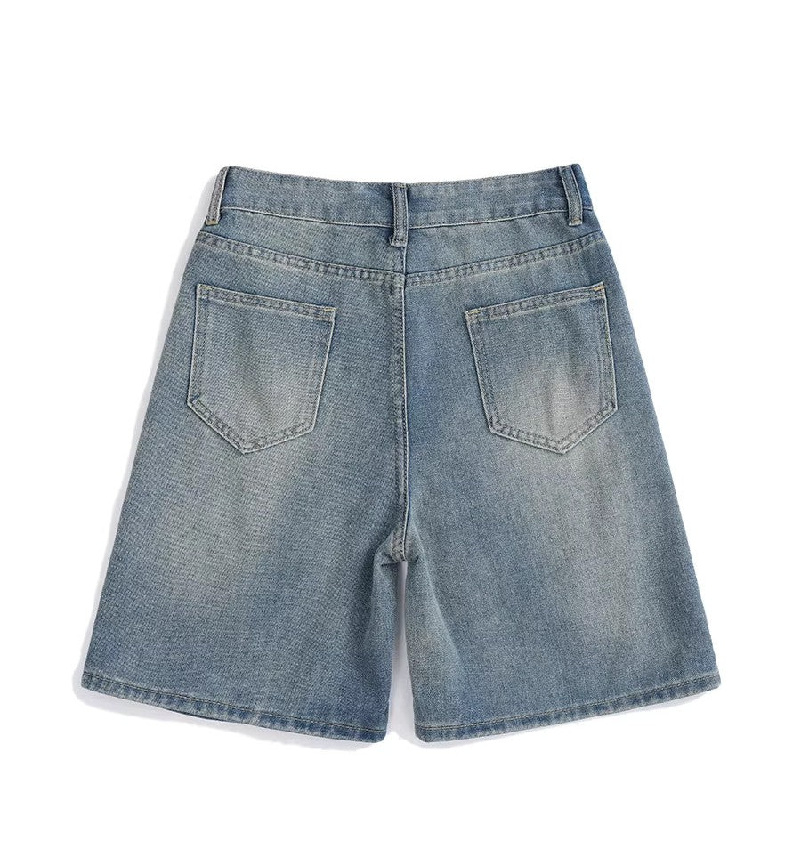 “Static Burn Distressed Jorts”